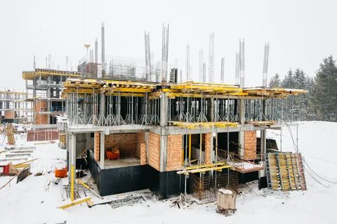Type of complex engineering construction of houses in winter time Stock Photos