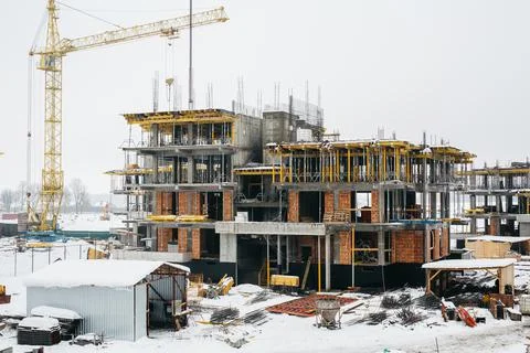 Type of complex engineering construction of houses in winter time Stock Photos