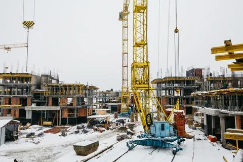 Type of complex engineering construction of houses in winter time Stock Photos