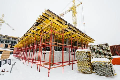 Type of complex engineering construction of houses in winter time Stock Photos
