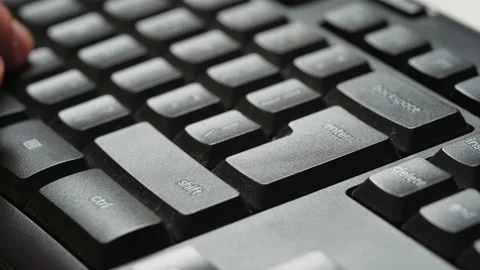 Type on computer keyboard and hitting the enter key. Stock Footage