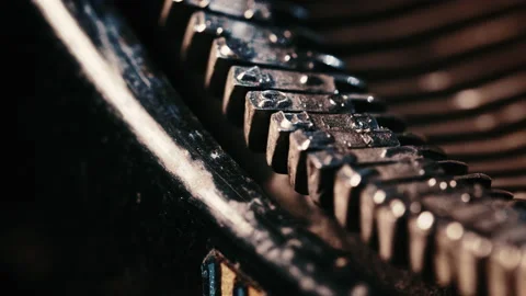 Type heads on an old typewriter Stock Footage 130318317