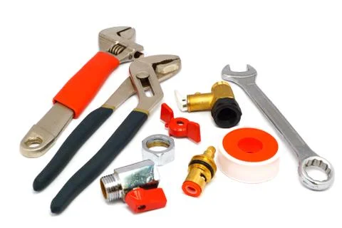 Type of plumbing tools against white background. Stock Photos