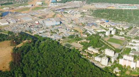 Type of settlements with flying airplane Stock Footage 52888383