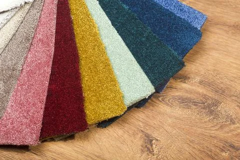 Types and samples of carpets in different colors. Carpets for rooms, apartmen Stock Photos