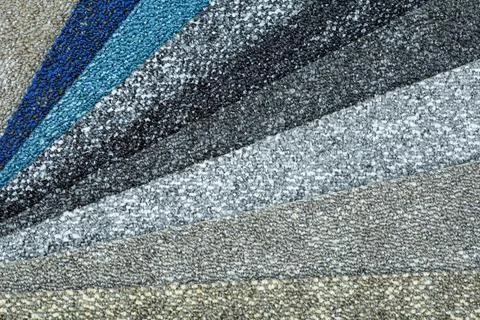 Types and samples of carpets in different colors. Carpets for rooms, apartmen Stock Photos
