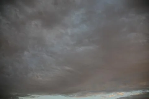 The types of clouds in the sky depend on the wind speed. Stock Photos