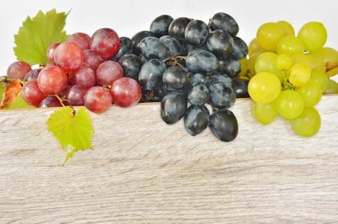 Types of grapes on wood Stock Photos
