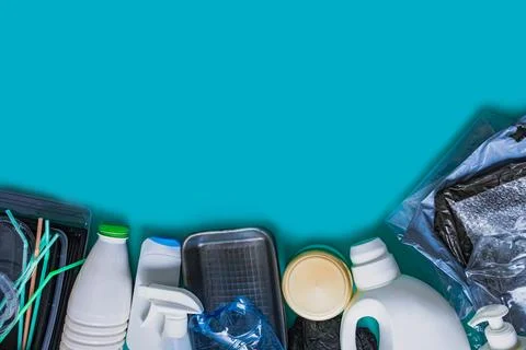 Types of plastic like a border on the blue Stock Photos