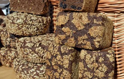 Types of Russian dark brown rye bread with sunflower seeds and raisins freshl Stock Photos