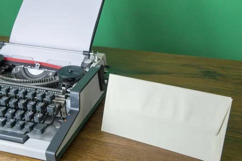 Typewriter and blank envelope 스톡 사진