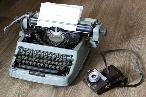 Typewriter and camera retro Stock Photos