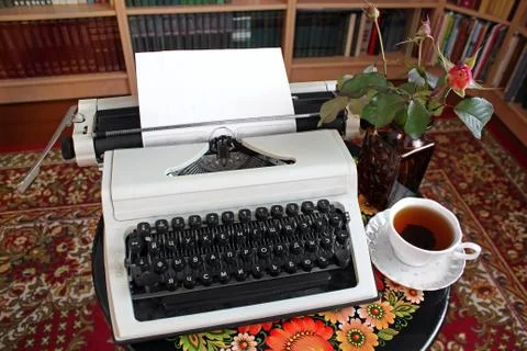 Typewriter and cup of tea. Workplace 写真素材