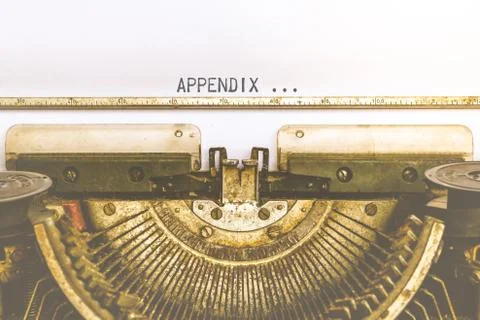Typewriter and empty white paper with a word Appendix , vintage style 스톡 사진
