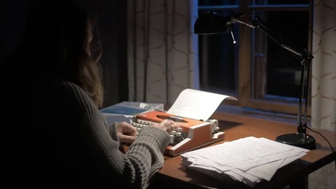 Typewriter and lady Stock Footage 122498360
