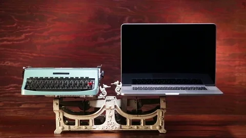 Typewriter and laptop on scale. Stock-Footage 85866246