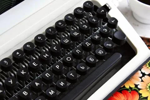 Typewriter on an antique table Fotos Stock