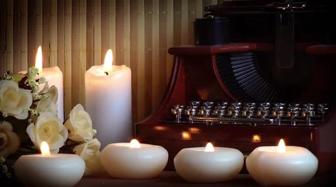 Typewriter candles and flowers  Stock Footage 62958554