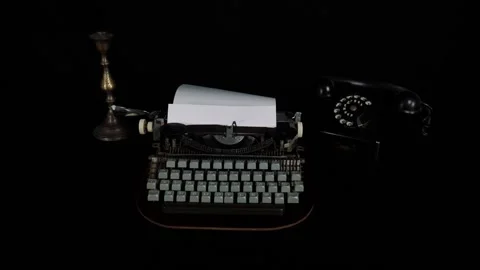 Typewriter, candlestick and old phone on the table 스톡 동영상 99300180