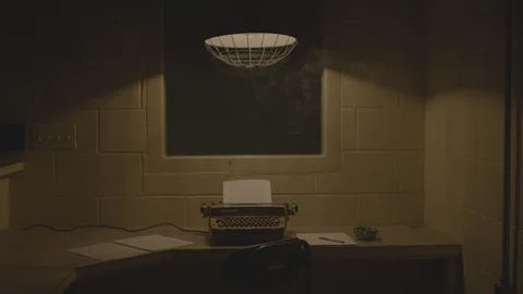 Typewriter Centered on Desk and Cigarette Smoke Wafting in the Air HD Video Video stock 92029367