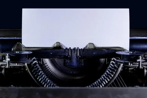 Typewriter with clear white page. Stock Photos