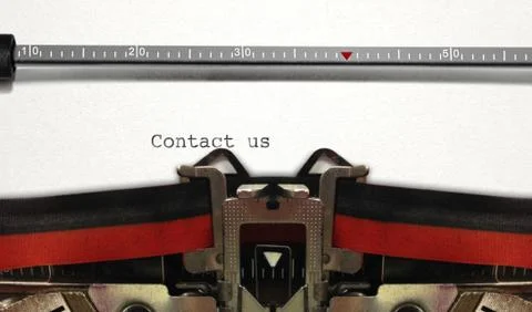 Typewriter close up with contact us Stock Photos