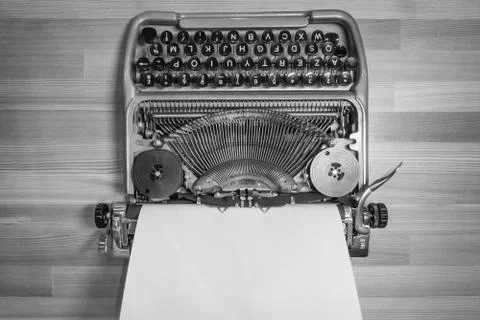 Typewriter ready for use with blank paper installed Stock Photos