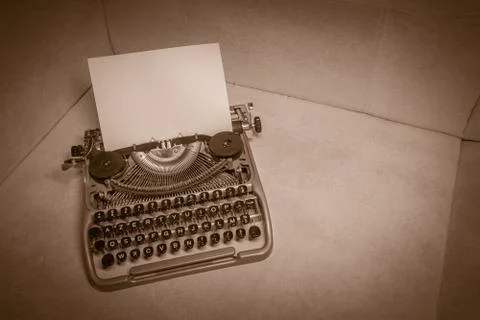 Typewriter ready for use with blank paper installed Stock Photos