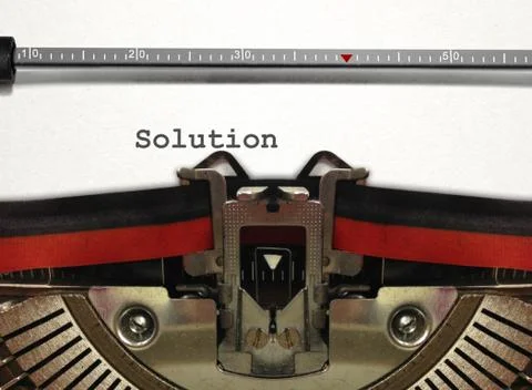 Typewriter with solution word Stock Photos
