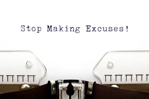 Typewriter stop making excuses 스톡 사진