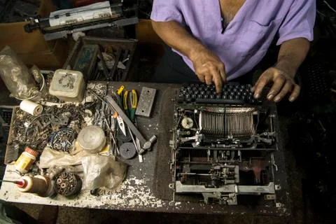 Typewriter technician  Stock Photos