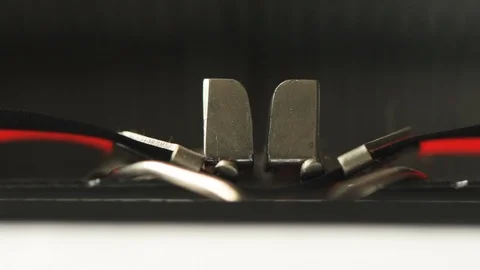 Typewriter type guide and typebars macro slow motion Stock-Footage 100750916