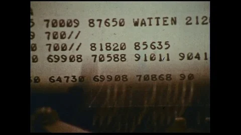As a typewriter types 6-digit numbers, a man feeds ducks in a park. Stock Footage
