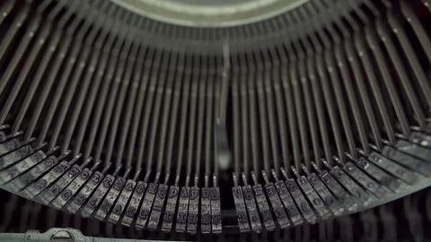 Typewriter typing shot from a high angle as the hammers hit Stock Footage 92525610