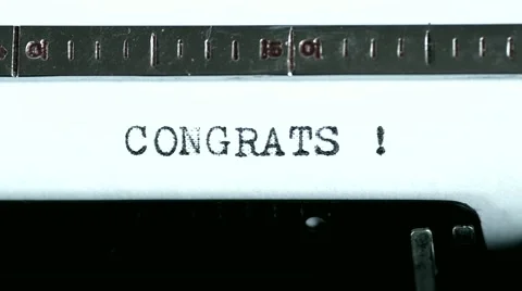 Typewriter. Typing text: congrats ! Stock Footage 47938665