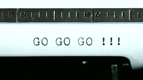 Typewriter. Typing text: go go go !!! Stock Footage 47938963