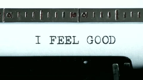 Typewriter. Typing text: i feel good Stock Footage 47939109