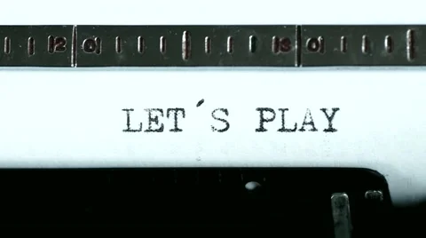 Typewriter. Typing text: let´s play Stock Footage 47938939
