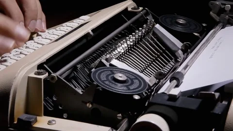 Typewriter work inside angled dark Stock Footage