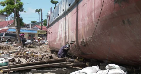 Typhoon Haiyan Huge Ship Washed Ashore By Storm Surge Stock Footage 36574994