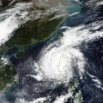 Typhoon Yutu in the Philippines. Elements of this image furnished by NASA ... Stock Photos