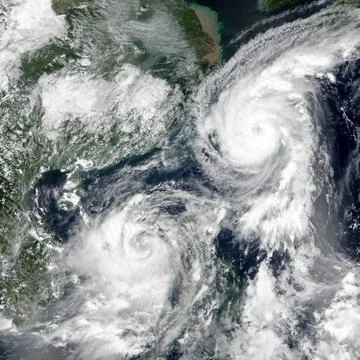 Typhoons Talim and Doksuri. Elements of this image furnished by NASA. Two ... Stockfoto's