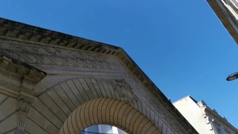 Typical ancient facade with beautiful arch in center of city south of France Stock Footage 131399484
