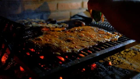 Typical and authentic Argentinian Barbecue Or Asado. Video stock 105144180