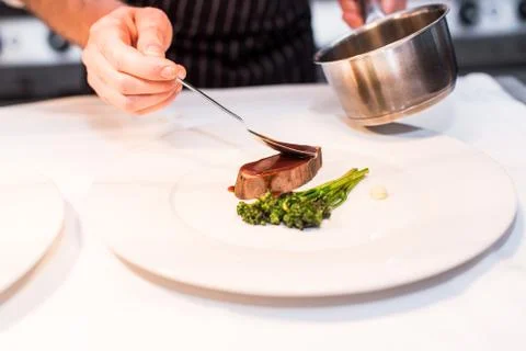 Typical Austrian meat dish with sauce and vegetables Stock Photos