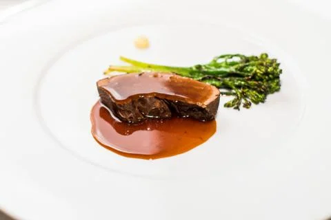 Typical Austrian meat dish with sauce and vegetables Stock Photos