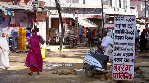 Typical back road in Jaipur, India showing people and vehicles. Stock Footage 37518220