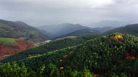 Typical basque landscape with mountains in rainy day Stock Photos