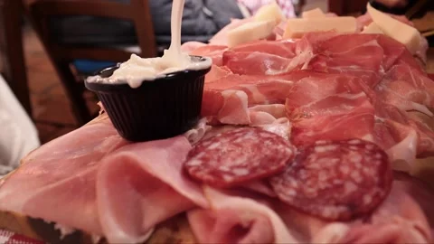 Typical Bolognese charcuterie board with Squaquerone cheese mortadella culat Stock Footage 339353829