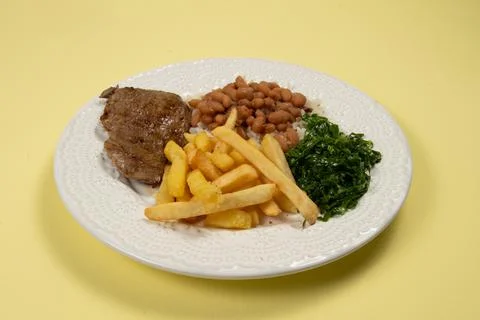 Typical Brazilian basic dish with rice, beans, steak, french fries and braise Stock-Fotos